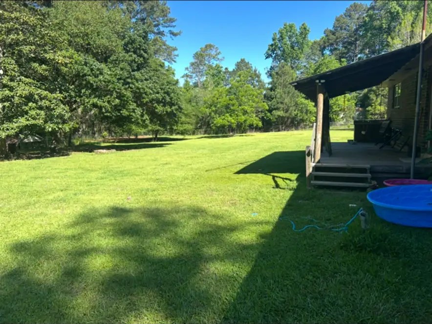 The one-acre fully fenced backyard